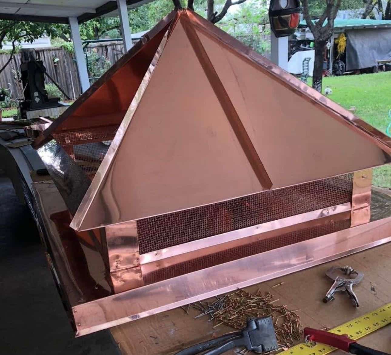 A custom copper chimney cap