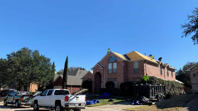 Roofer works on roof installation